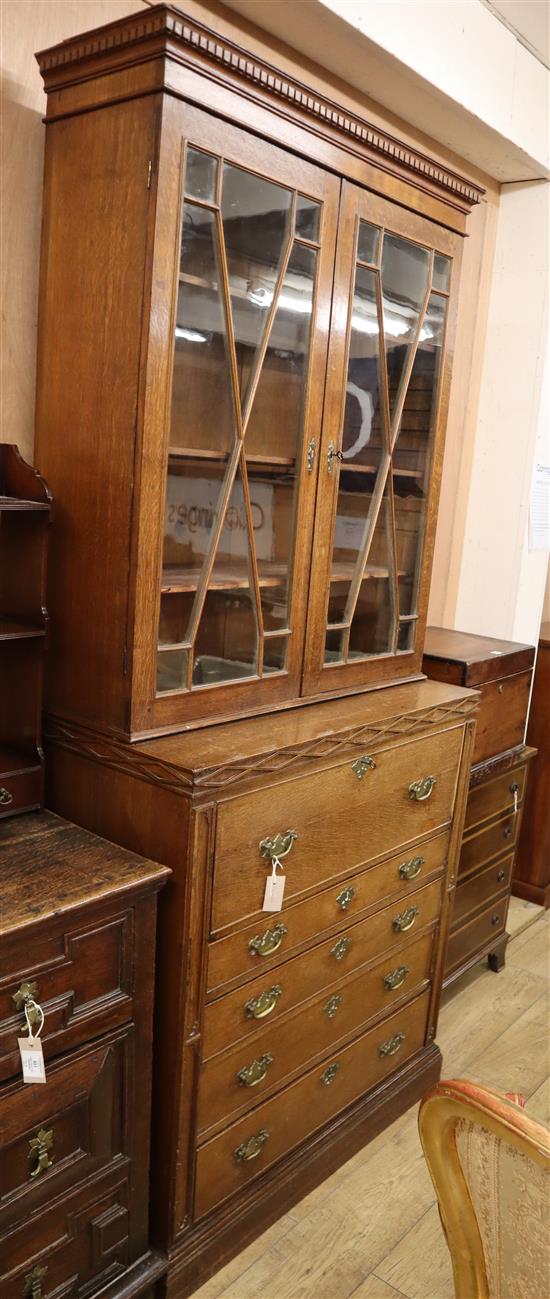 An oak secretaire bookcase W.98cm